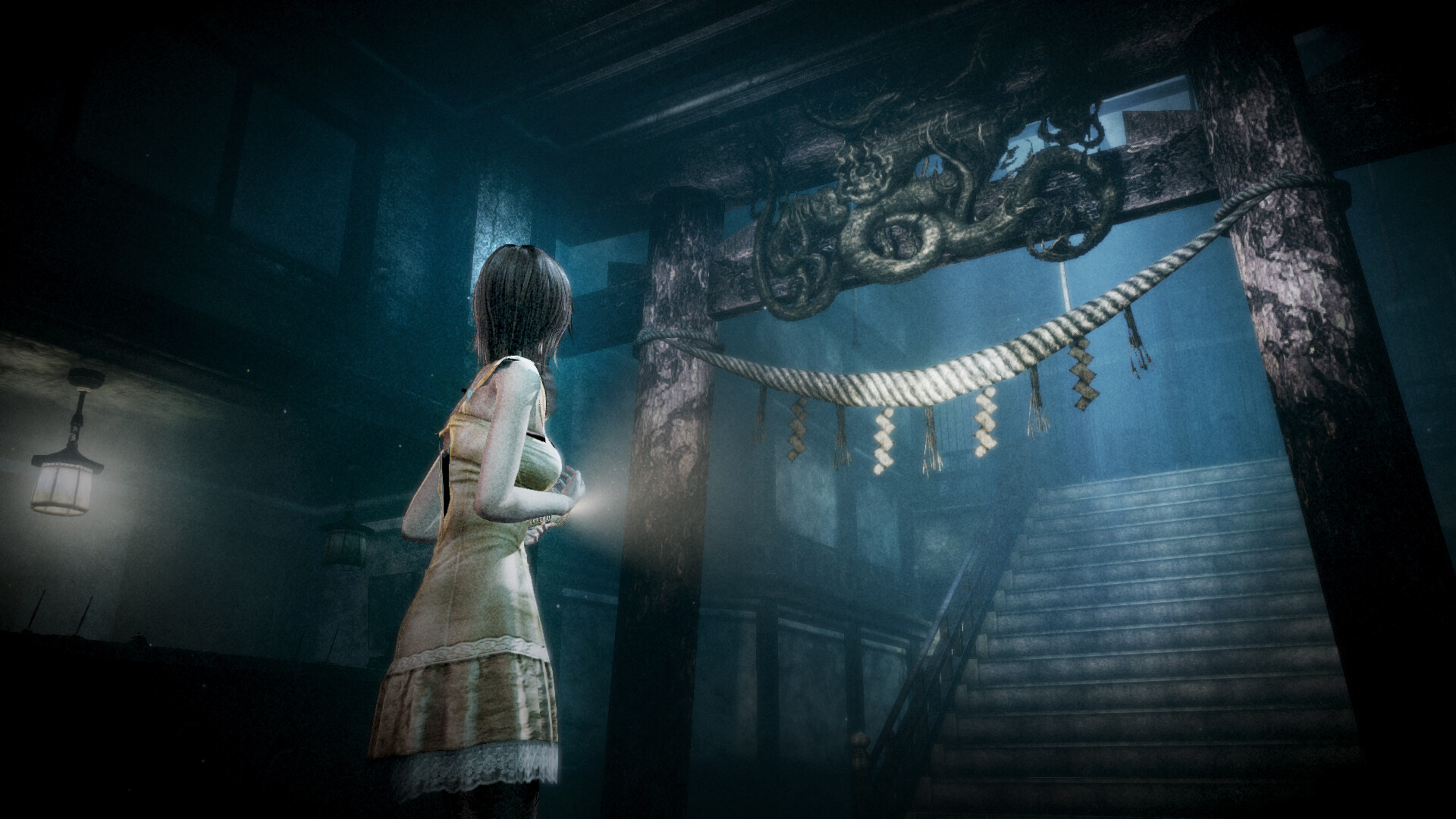 Girl with Camera Obscura in a dark Japanese shrine