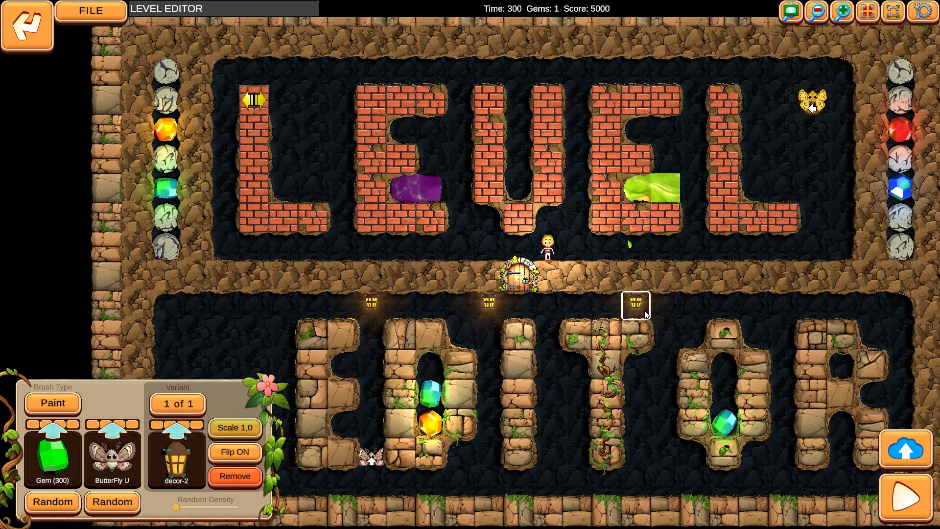 The image shows a game level editor screen with the words "LEVEL EDITOR" crafted from different materials inside a cave-like environment. The top word "LEVEL" is made from red bricks with glowing colored blocks embedded within some letters, while the bottom word "EDITOR" is constructed from stone blocks decorated with vines and glowing gems. A small cartoon character stands near a decorated wooden door between the two words, and various icons and control buttons for editing the level are visible around the edges of the screen. The scene is illuminated by small lanterns, enhancing the underground, adventurous atmosphere.