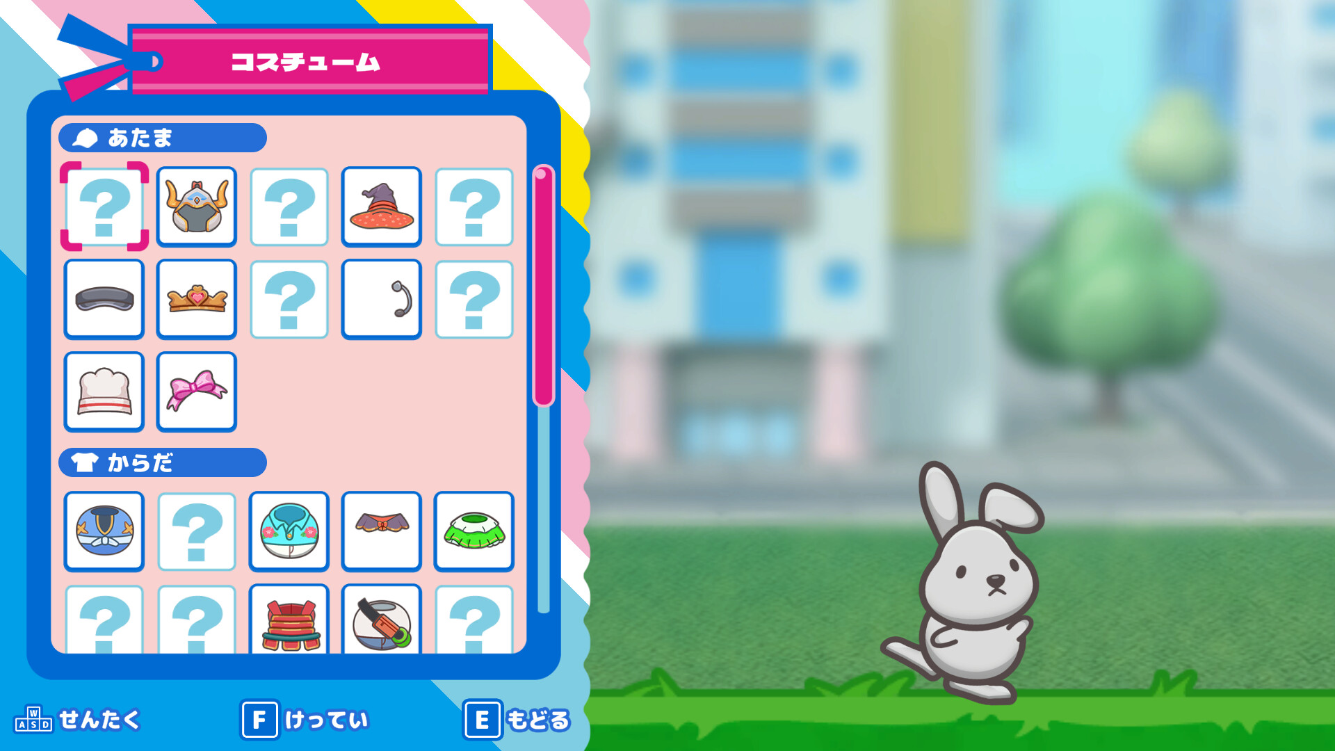 The image shows a colorful costume selection menu from a video game, with two main sections labeled in Japanese: one for headgear and one for body outfits. On the left side, various icons depict different hats and accessories, some of which are locked and represented by question marks. Below, there are several clothing options, including a blue outfit, a floral top, and armor. On the right side of the screen, there is a small, cute gray cartoon rabbit standing on green grass with an urban backdrop featuring blurred buildings and trees. Controls for selection and confirmation are displayed at the bottom in Japanese with associated keyboard keys.