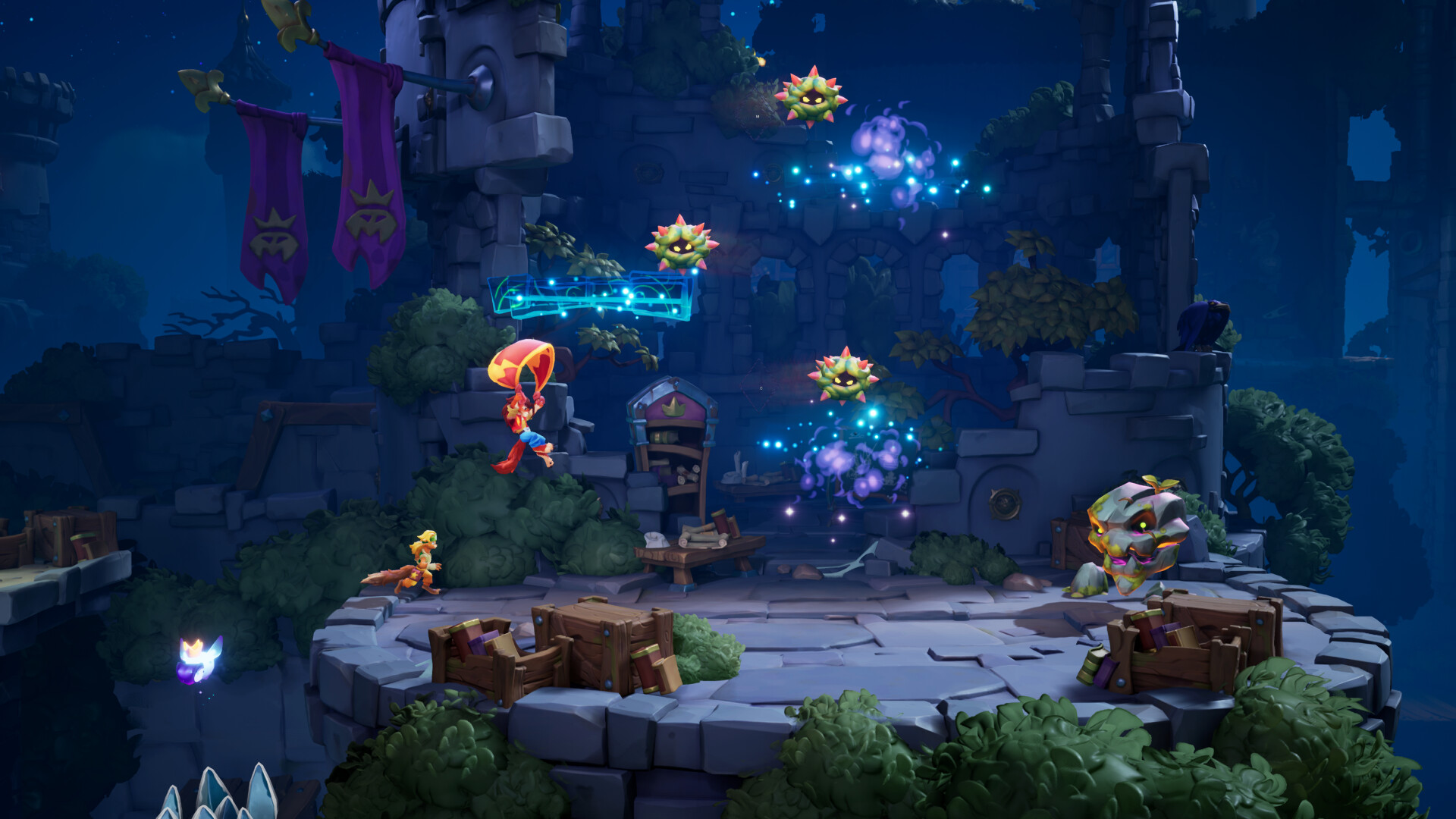 The image depicts a vibrant, nighttime scene set in a ruined stone courtyard suspended high above a chasm, illuminated by soft blue lighting. In the center, a character wearing a red outfit and wielding a large, glowing hammer is mid-air, seemingly attacking three floating, spiked, greenish-yellow creatures with angry faces. The area is surrounded by crumbling stone walls, purple banners with golden crowns hanging from a pole, dense green foliage, and scattered wooden crates and books, enhancing the atmosphere of an ancient, mystical battleground. A glowing blue musical note flows through the air near the character, adding a magical element to the scene.