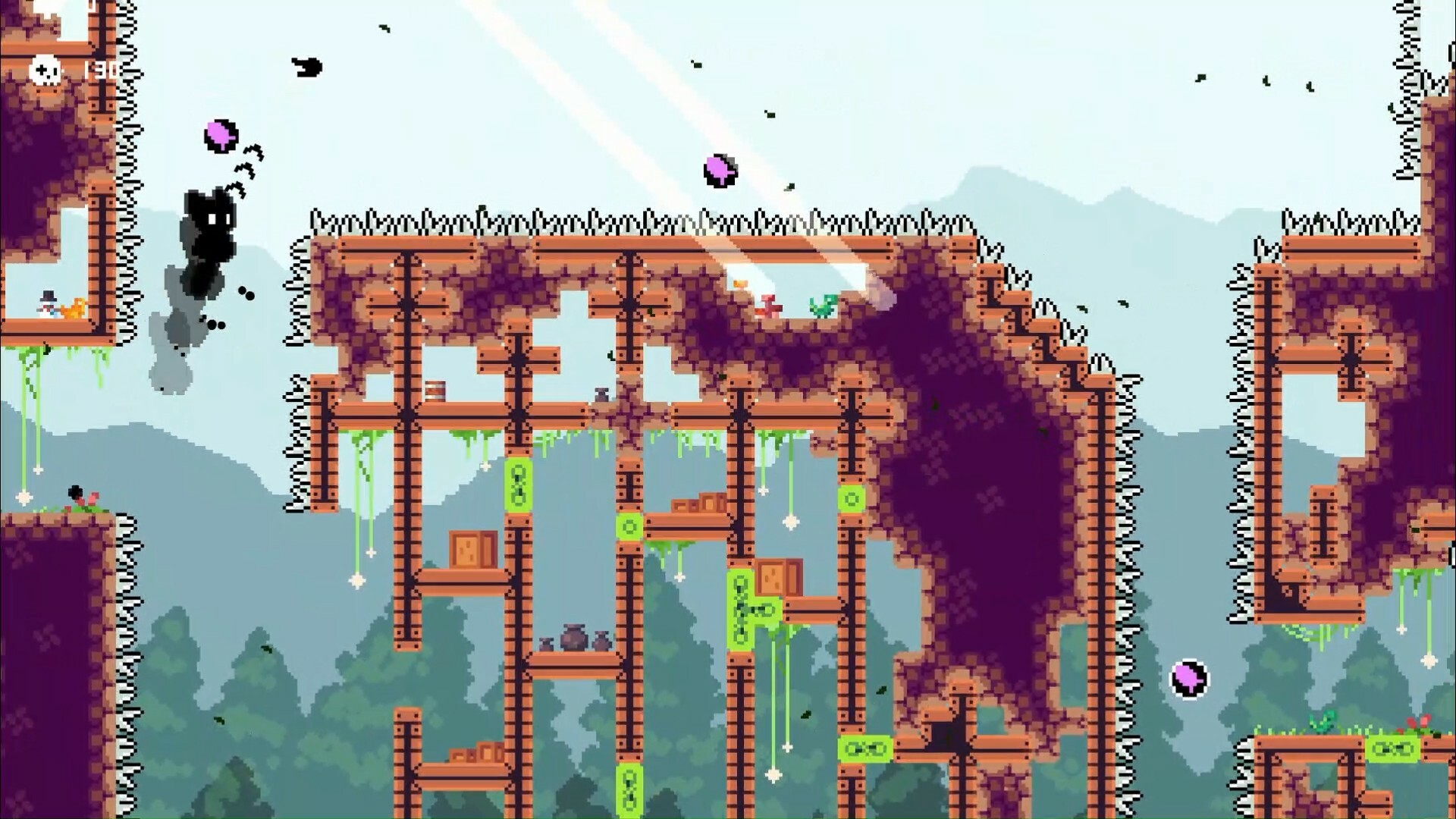 The image shows a pixel art platformer video game scene featuring a character leaping in mid-air within a complex, vertically-oriented environment. The setting consists of brown and purple blocky structures with wooden ladders and platforms, some covered in spikes along the edges. The background displays a forest with green trees and mountains under a light blue sky. Various small objects and obstacles, including green patches and spinning purple spheres, are scattered throughout the level, adding to the challenge. The top-left corner includes a game interface element displaying the number 13.