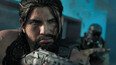A close-up of a Multiplayer Operator looking menacingly ahead, his weapon raised.