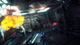 The player shooting a drone enemy and it exploding.