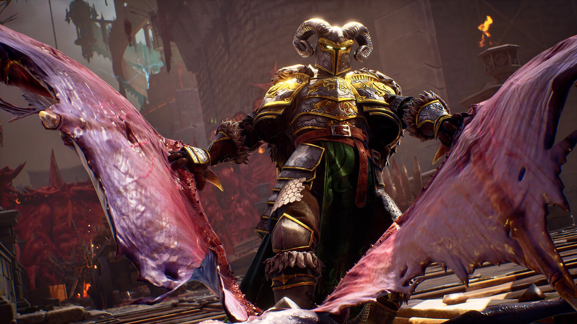 A monstrous, armored figure with a ram’s horn helmet looms above, tearing apart the strange carcass of a fallen winged creature. An enormous castle rises in the background. 