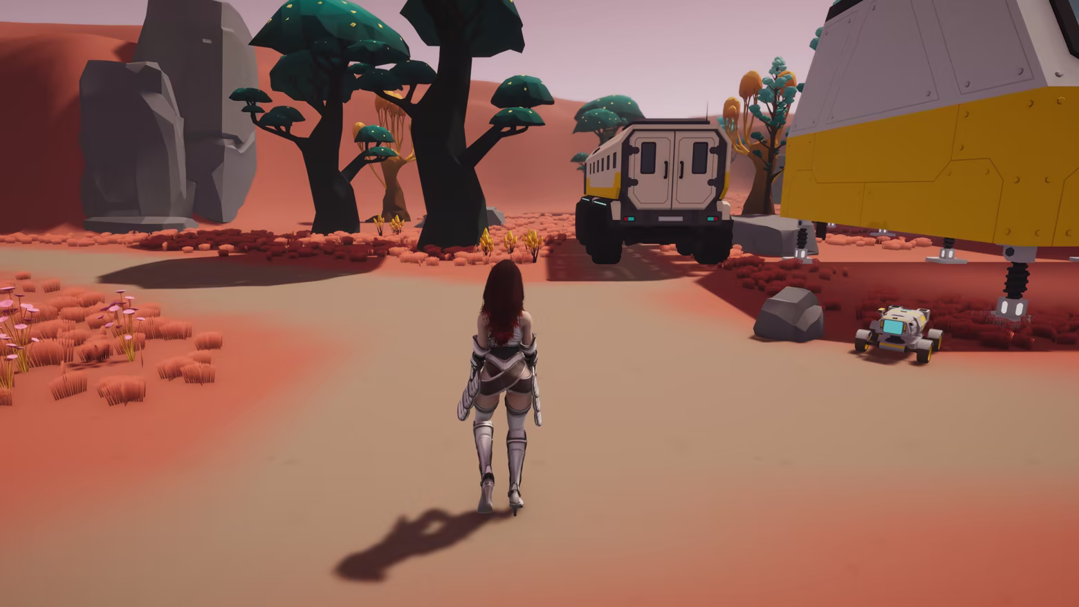 The protagonist standing among the prebuilt base buildings at the edge of the alien wilderness.